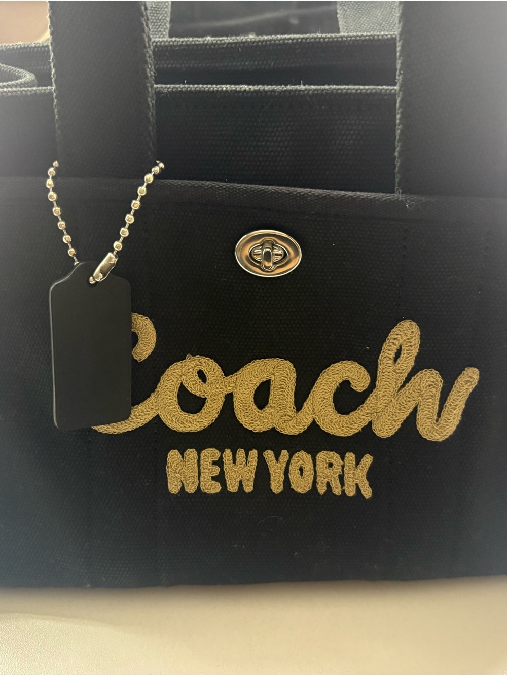 Coach Black Canvas Tote with Gold Script Logo